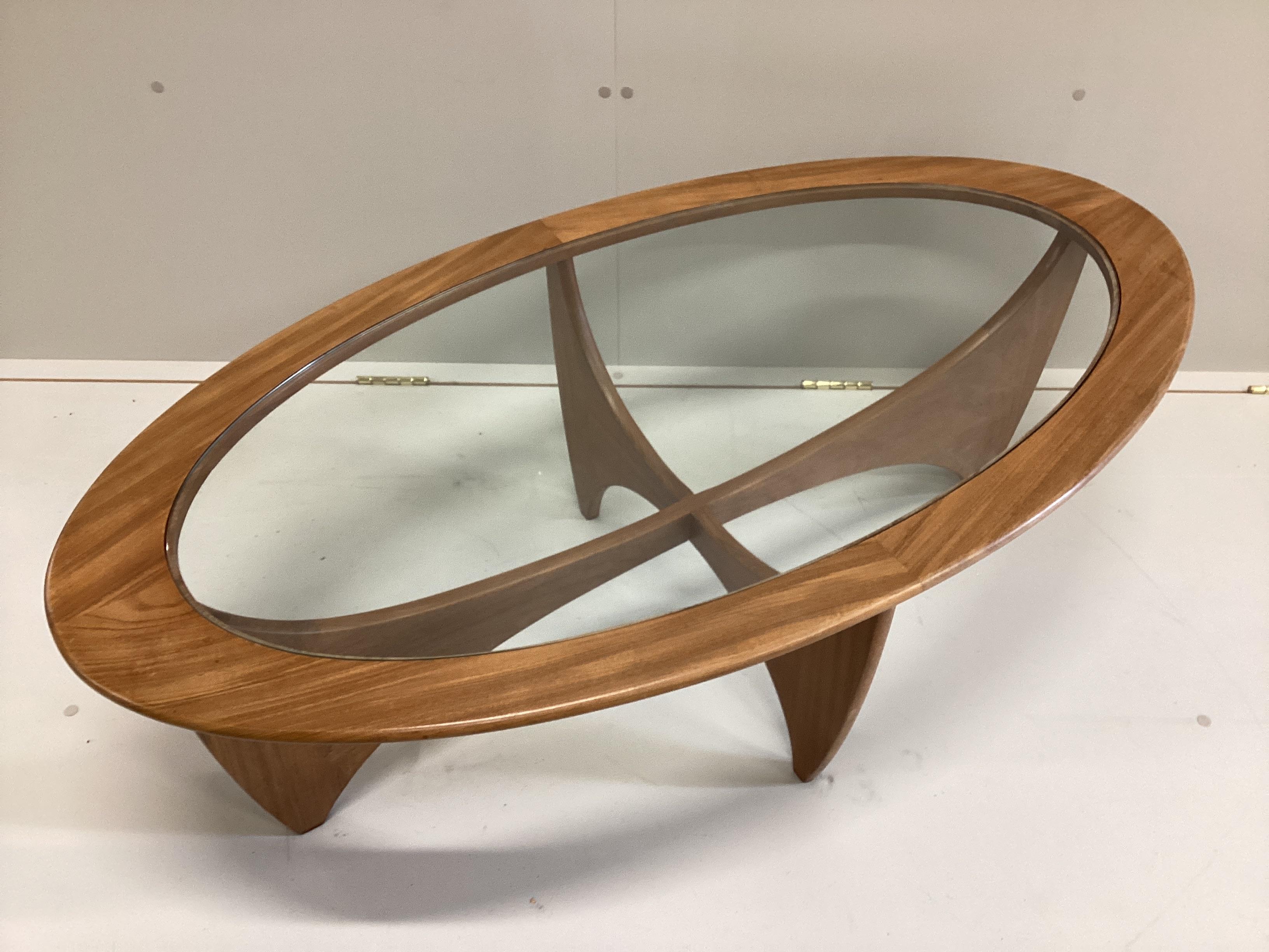 A mid century G Plan Astro teak oval coffee table, width 122cm, depth 66cm, height 42cm